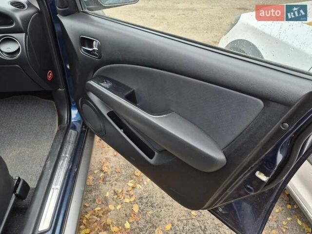 Синій Міцубісі Аутлендер, об'ємом двигуна 2 л та пробігом 211 тис. км за 4600 $, фото 16 на Automoto.ua