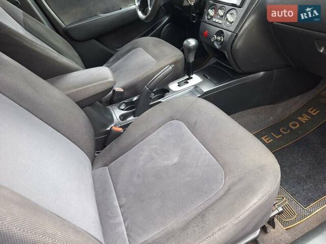 Синій Міцубісі Аутлендер, об'ємом двигуна 2.4 л та пробігом 234 тис. км за 4100 $, фото 29 на Automoto.ua