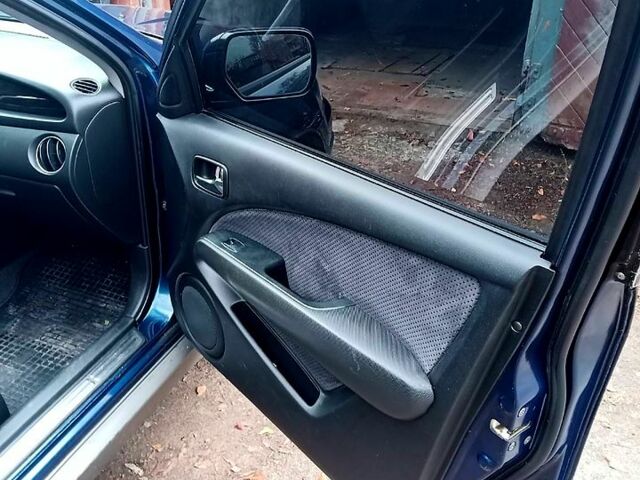 Синий Мицубиси Аутлендер, объемом двигателя 2 л и пробегом 195 тыс. км за 6500 $, фото 8 на Automoto.ua