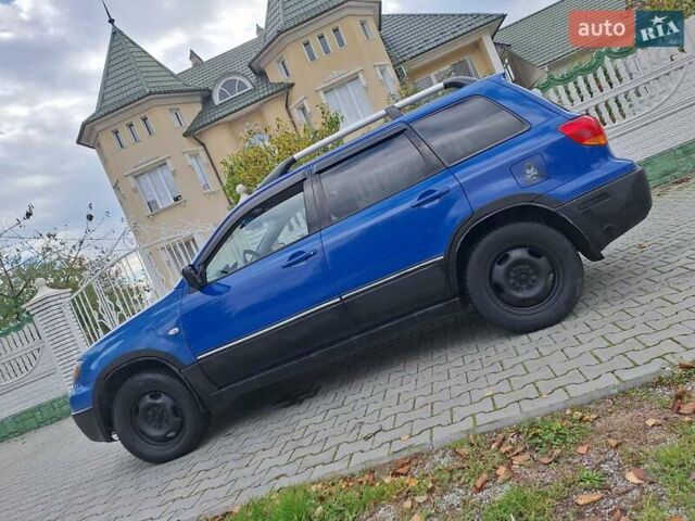 Синій Міцубісі Аутлендер, об'ємом двигуна 2.4 л та пробігом 234 тис. км за 4300 $, фото 2 на Automoto.ua