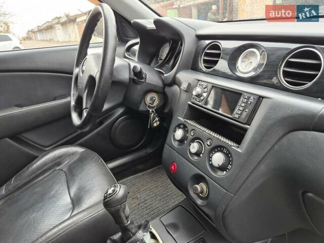 Синій Міцубісі Аутлендер, об'ємом двигуна 2 л та пробігом 211 тис. км за 4600 $, фото 17 на Automoto.ua