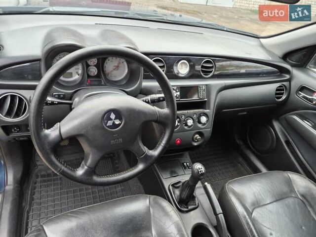 Синій Міцубісі Аутлендер, об'ємом двигуна 2 л та пробігом 211 тис. км за 4600 $, фото 10 на Automoto.ua