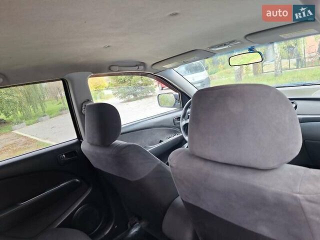 Синій Міцубісі Аутлендер, об'ємом двигуна 2.4 л та пробігом 234 тис. км за 4300 $, фото 22 на Automoto.ua