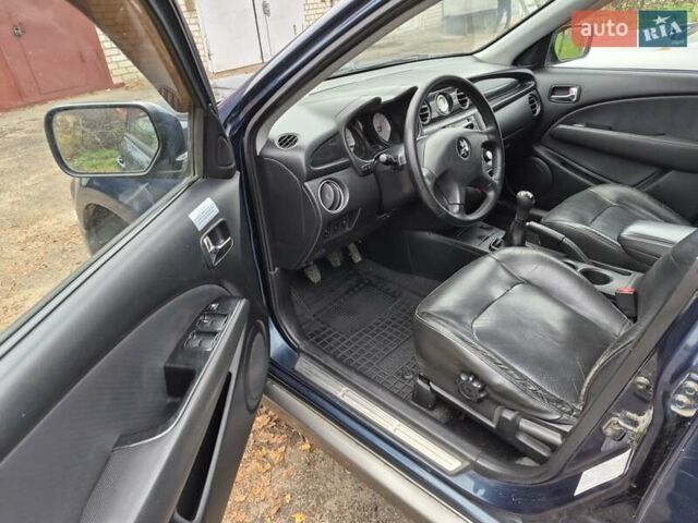 Синій Міцубісі Аутлендер, об'ємом двигуна 2 л та пробігом 211 тис. км за 4600 $, фото 9 на Automoto.ua