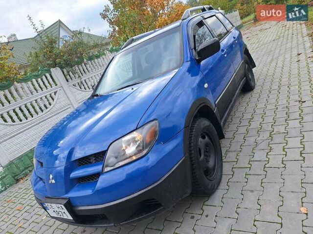 Синій Міцубісі Аутлендер, об'ємом двигуна 2.4 л та пробігом 234 тис. км за 4100 $, фото 16 на Automoto.ua