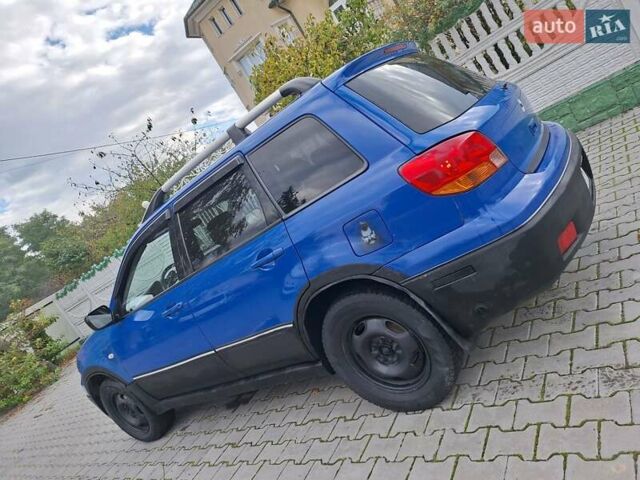 Синій Міцубісі Аутлендер, об'ємом двигуна 2.4 л та пробігом 234 тис. км за 4300 $, фото 5 на Automoto.ua