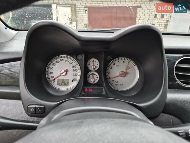 Синій Міцубісі Аутлендер, об'ємом двигуна 2 л та пробігом 211 тис. км за 4600 $, фото 12 на Automoto.ua