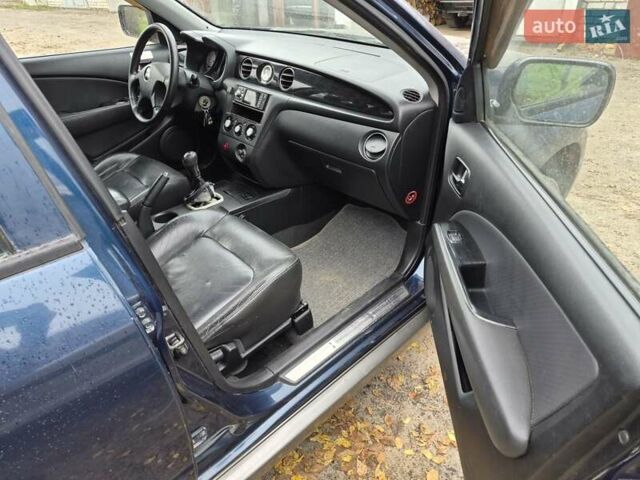 Синій Міцубісі Аутлендер, об'ємом двигуна 2 л та пробігом 211 тис. км за 4600 $, фото 19 на Automoto.ua