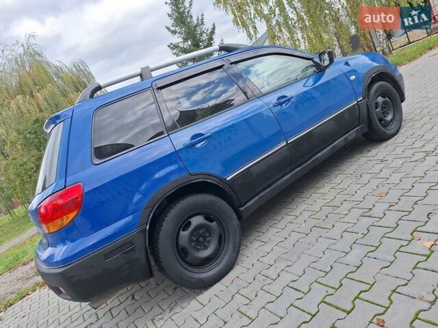 Синій Міцубісі Аутлендер, об'ємом двигуна 2.4 л та пробігом 234 тис. км за 4300 $, фото 9 на Automoto.ua