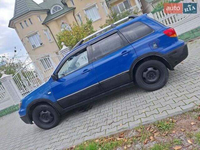 Синій Міцубісі Аутлендер, об'ємом двигуна 2.4 л та пробігом 234 тис. км за 4100 $, фото 13 на Automoto.ua