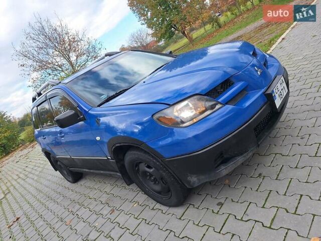 Синій Міцубісі Аутлендер, об'ємом двигуна 2.4 л та пробігом 234 тис. км за 4300 $, фото 12 на Automoto.ua