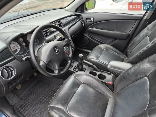 Синій Міцубісі Аутлендер, об'ємом двигуна 2 л та пробігом 211 тис. км за 4600 $, фото 2 на Automoto.ua