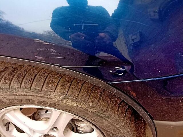 Синий Мицубиси Аутлендер, объемом двигателя 2 л и пробегом 195 тыс. км за 6500 $, фото 2 на Automoto.ua