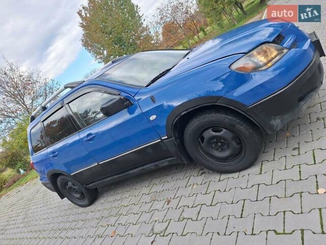 Синій Міцубісі Аутлендер, об'ємом двигуна 2.4 л та пробігом 234 тис. км за 4100 $, фото 10 на Automoto.ua