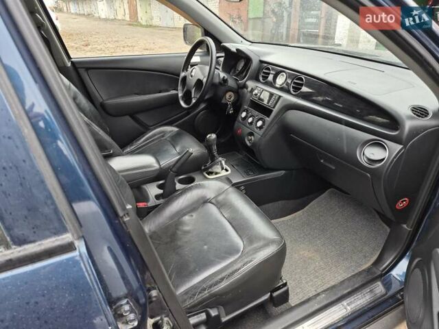 Синій Міцубісі Аутлендер, об'ємом двигуна 2 л та пробігом 211 тис. км за 4600 $, фото 18 на Automoto.ua