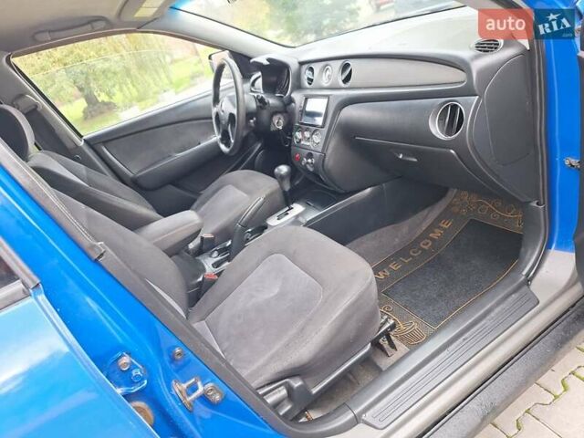 Синій Міцубісі Аутлендер, об'ємом двигуна 2.4 л та пробігом 234 тис. км за 4100 $, фото 24 на Automoto.ua