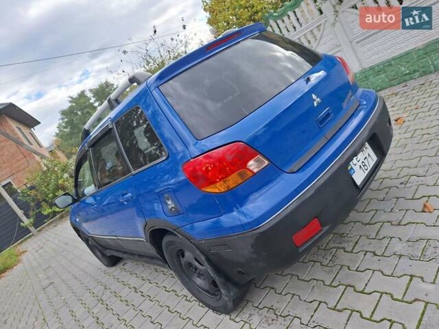 Синій Міцубісі Аутлендер, об'ємом двигуна 2.4 л та пробігом 234 тис. км за 4300 $, фото 3 на Automoto.ua