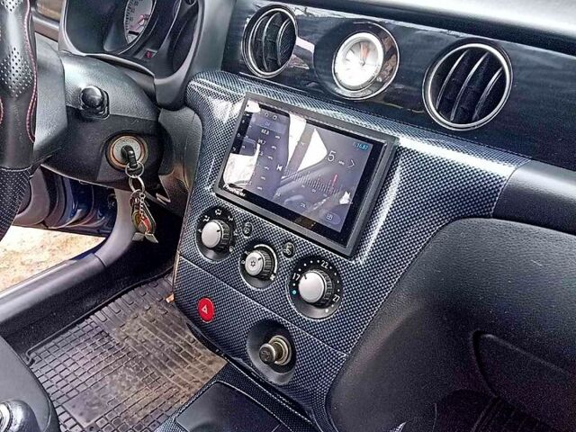 Синий Мицубиси Аутлендер, объемом двигателя 2 л и пробегом 195 тыс. км за 6500 $, фото 11 на Automoto.ua