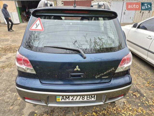 Синій Міцубісі Аутлендер, об'ємом двигуна 2 л та пробігом 211 тис. км за 4600 $, фото 3 на Automoto.ua