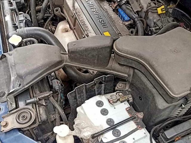 Синий Мицубиси Аутлендер, объемом двигателя 2 л и пробегом 195 тыс. км за 6500 $, фото 5 на Automoto.ua