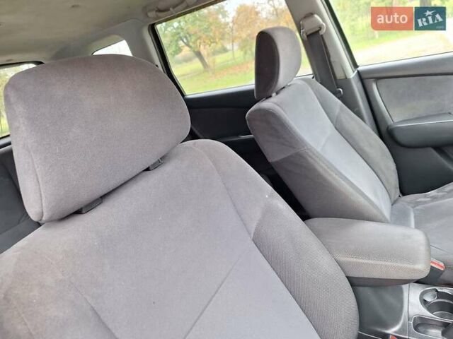 Синій Міцубісі Аутлендер, об'ємом двигуна 2.4 л та пробігом 234 тис. км за 4300 $, фото 25 на Automoto.ua