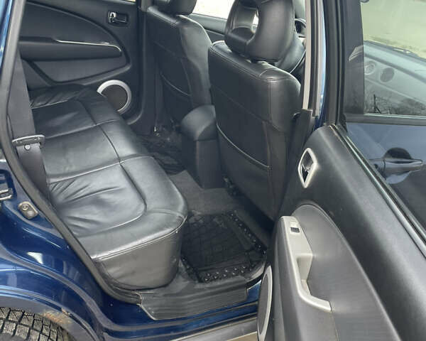 Синий Мицубиси Аутлендер, объемом двигателя 2 л и пробегом 231 тыс. км за 4900 $, фото 11 на Automoto.ua