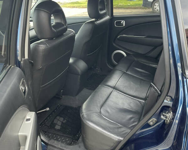 Синий Мицубиси Аутлендер, объемом двигателя 2 л и пробегом 231 тыс. км за 4900 $, фото 6 на Automoto.ua