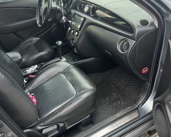 Синий Мицубиси Аутлендер, объемом двигателя 2.38 л и пробегом 300 тыс. км за 4200 $, фото 4 на Automoto.ua