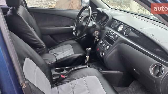 Синий Мицубиси Аутлендер, объемом двигателя 2 л и пробегом 400 тыс. км за 4400 $, фото 14 на Automoto.ua