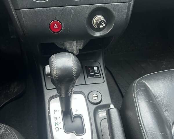 Синий Мицубиси Аутлендер, объемом двигателя 2.38 л и пробегом 300 тыс. км за 4200 $, фото 7 на Automoto.ua