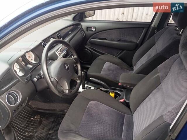 Синий Мицубиси Аутлендер, объемом двигателя 2.38 л и пробегом 175 тыс. км за 6500 $, фото 9 на Automoto.ua