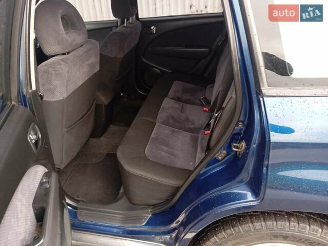 Синий Мицубиси Аутлендер, объемом двигателя 2.38 л и пробегом 175 тыс. км за 6500 $, фото 10 на Automoto.ua