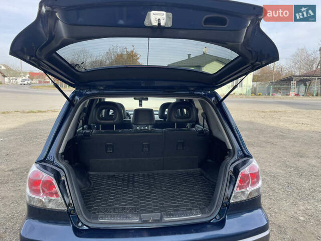 Синий Мицубиси Аутлендер, объемом двигателя 2 л и пробегом 231 тыс. км за 4900 $, фото 13 на Automoto.ua