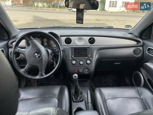 Синий Мицубиси Аутлендер, объемом двигателя 2 л и пробегом 231 тыс. км за 4900 $, фото 7 на Automoto.ua