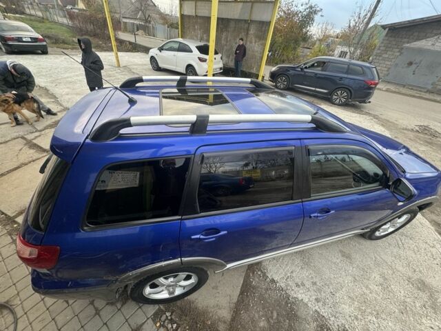 Синій Міцубісі Аутлендер, об'ємом двигуна 2.4 л та пробігом 220 тис. км за 4500 $, фото 3 на Automoto.ua