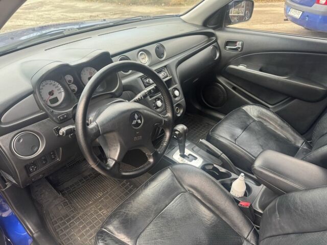 Синій Міцубісі Аутлендер, об'ємом двигуна 2.4 л та пробігом 220 тис. км за 4500 $, фото 5 на Automoto.ua