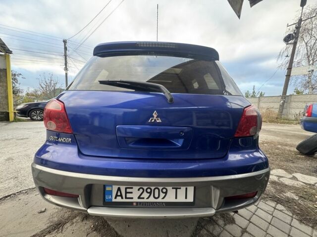 Синій Міцубісі Аутлендер, об'ємом двигуна 2.4 л та пробігом 220 тис. км за 4500 $, фото 2 на Automoto.ua