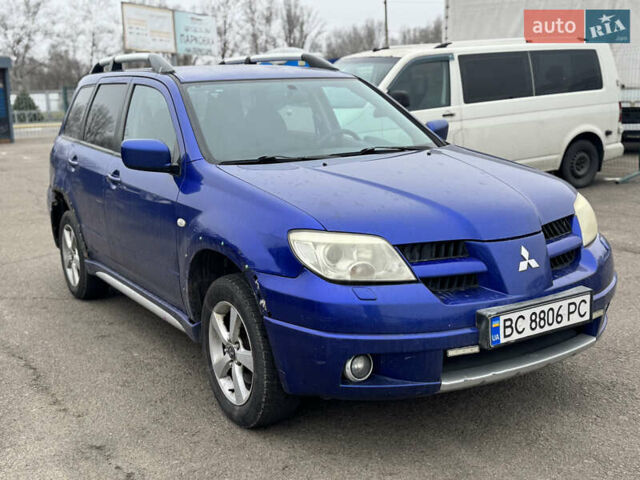 Синий Мицубиси Аутлендер, объемом двигателя 2.4 л и пробегом 245 тыс. км за 4600 $, фото 7 на Automoto.ua