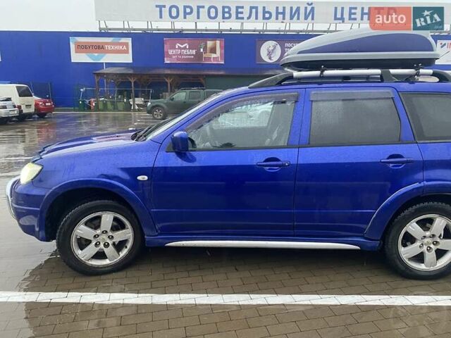 Синій Міцубісі Аутлендер, об'ємом двигуна 2 л та пробігом 234 тис. км за 5500 $, фото 1 на Automoto.ua