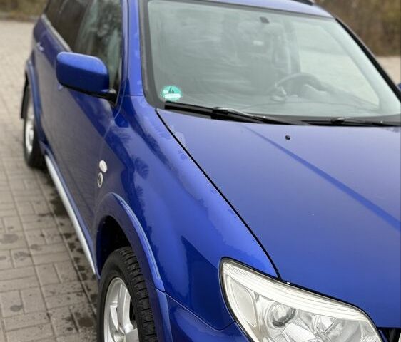 Синий Мицубиси Аутлендер, объемом двигателя 2.4 л и пробегом 243 тыс. км за 5000 $, фото 17 на Automoto.ua