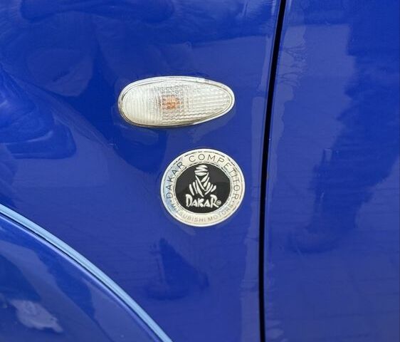 Синий Мицубиси Аутлендер, объемом двигателя 2.4 л и пробегом 243 тыс. км за 5000 $, фото 7 на Automoto.ua