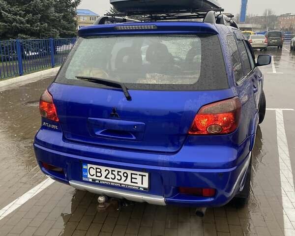 Синій Міцубісі Аутлендер, об'ємом двигуна 2 л та пробігом 234 тис. км за 5500 $, фото 4 на Automoto.ua
