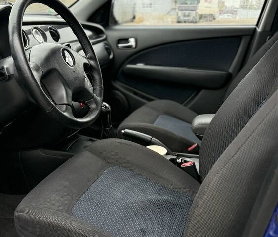 Синий Мицубиси Аутлендер, объемом двигателя 2.4 л и пробегом 243 тыс. км за 5000 $, фото 11 на Automoto.ua