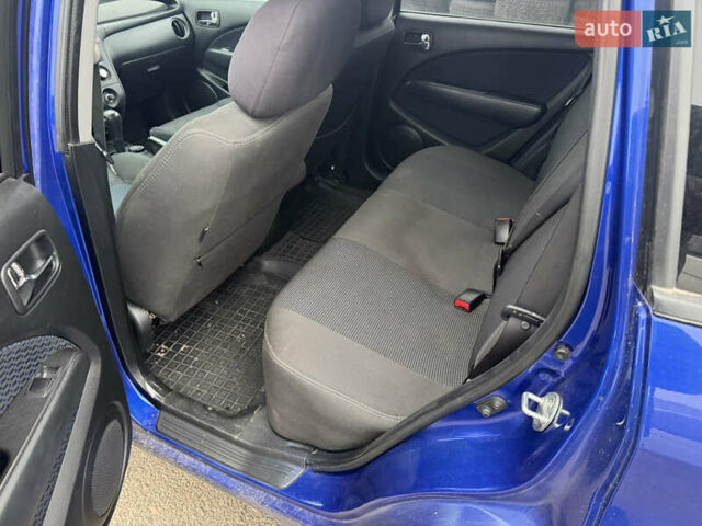 Синий Мицубиси Аутлендер, объемом двигателя 2.4 л и пробегом 245 тыс. км за 4600 $, фото 11 на Automoto.ua