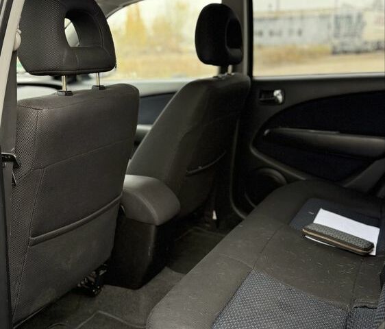 Синий Мицубиси Аутлендер, объемом двигателя 2.4 л и пробегом 243 тыс. км за 5000 $, фото 18 на Automoto.ua