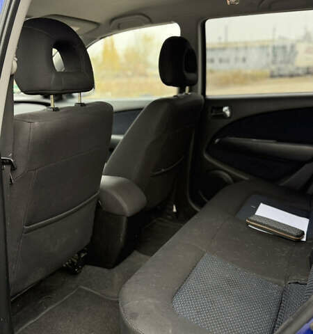 Синий Мицубиси Аутлендер, объемом двигателя 2.4 л и пробегом 243 тыс. км за 5000 $, фото 18 на Automoto.ua