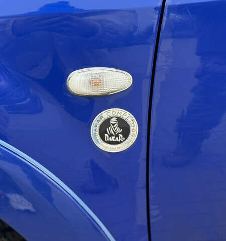 Синий Мицубиси Аутлендер, объемом двигателя 2.4 л и пробегом 243 тыс. км за 5000 $, фото 7 на Automoto.ua