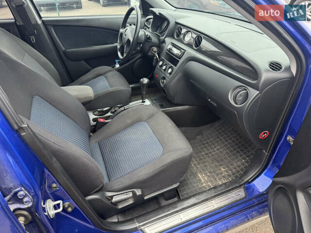 Синий Мицубиси Аутлендер, объемом двигателя 2.4 л и пробегом 245 тыс. км за 4600 $, фото 8 на Automoto.ua