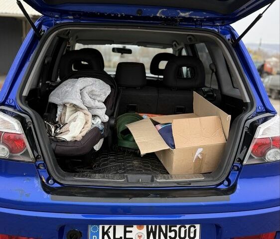 Синий Мицубиси Аутлендер, объемом двигателя 2.4 л и пробегом 243 тыс. км за 5000 $, фото 8 на Automoto.ua