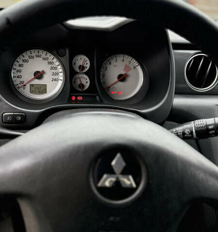 Синий Мицубиси Аутлендер, объемом двигателя 2.4 л и пробегом 243 тыс. км за 5000 $, фото 22 на Automoto.ua